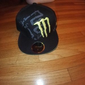 A New Era fox and monster energy hat